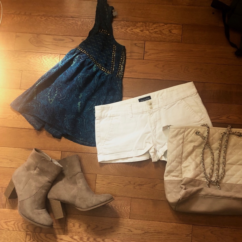White shorts, sequenced flowing top, boots